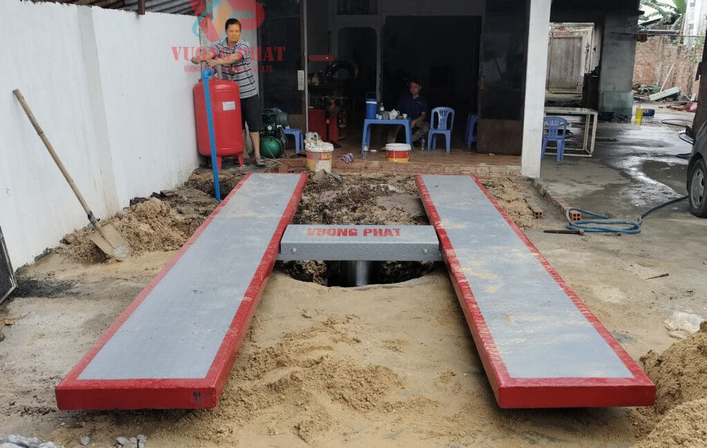 Cầu nâng ô tô 1 trụ âm nền chữ H, dịch vụ sửa chữa cầu nâng ô tô 1 trụ