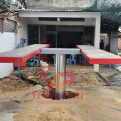 Cầu nâng ô tô 1 trụ âm nền chữ H