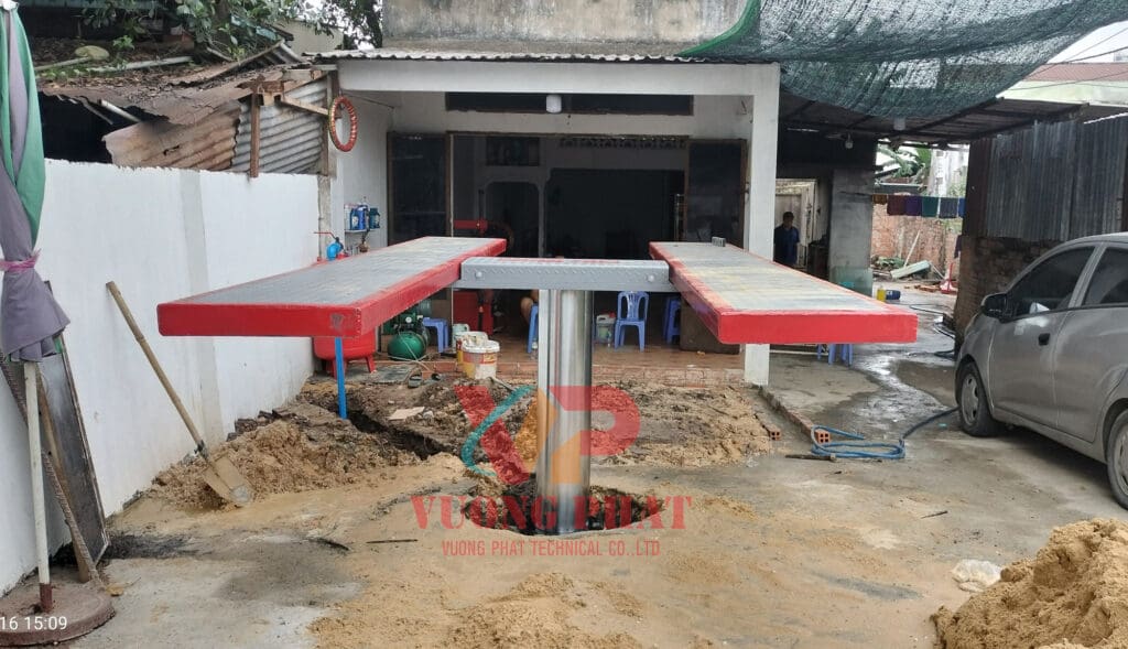 Cầu nâng ô tô 1 trụ âm nên chữ H