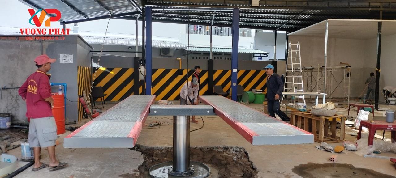 Cầu nâng ô tô 1 trụ âm nền
